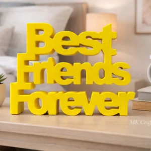 Yellow wooden “Best Friends Forever” decorative showpiece by MK Crafts placed on a shelf with plants and candles – handcrafted friendship gift décor.