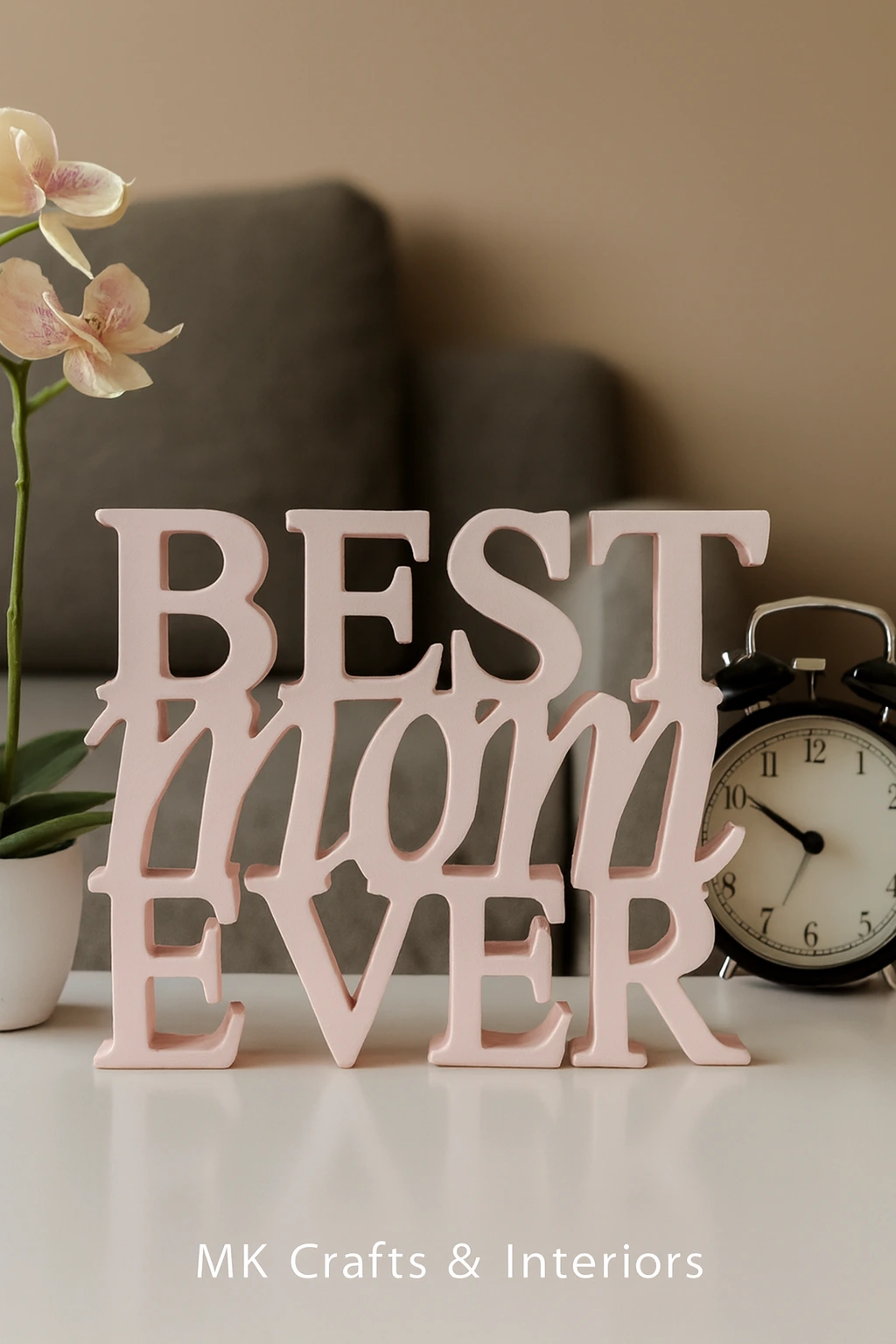 Light Peach wooden “Best Mom Ever” decorative showpiece by MK Crafts displayed on a table with plant décor – handcrafted mother gift item.