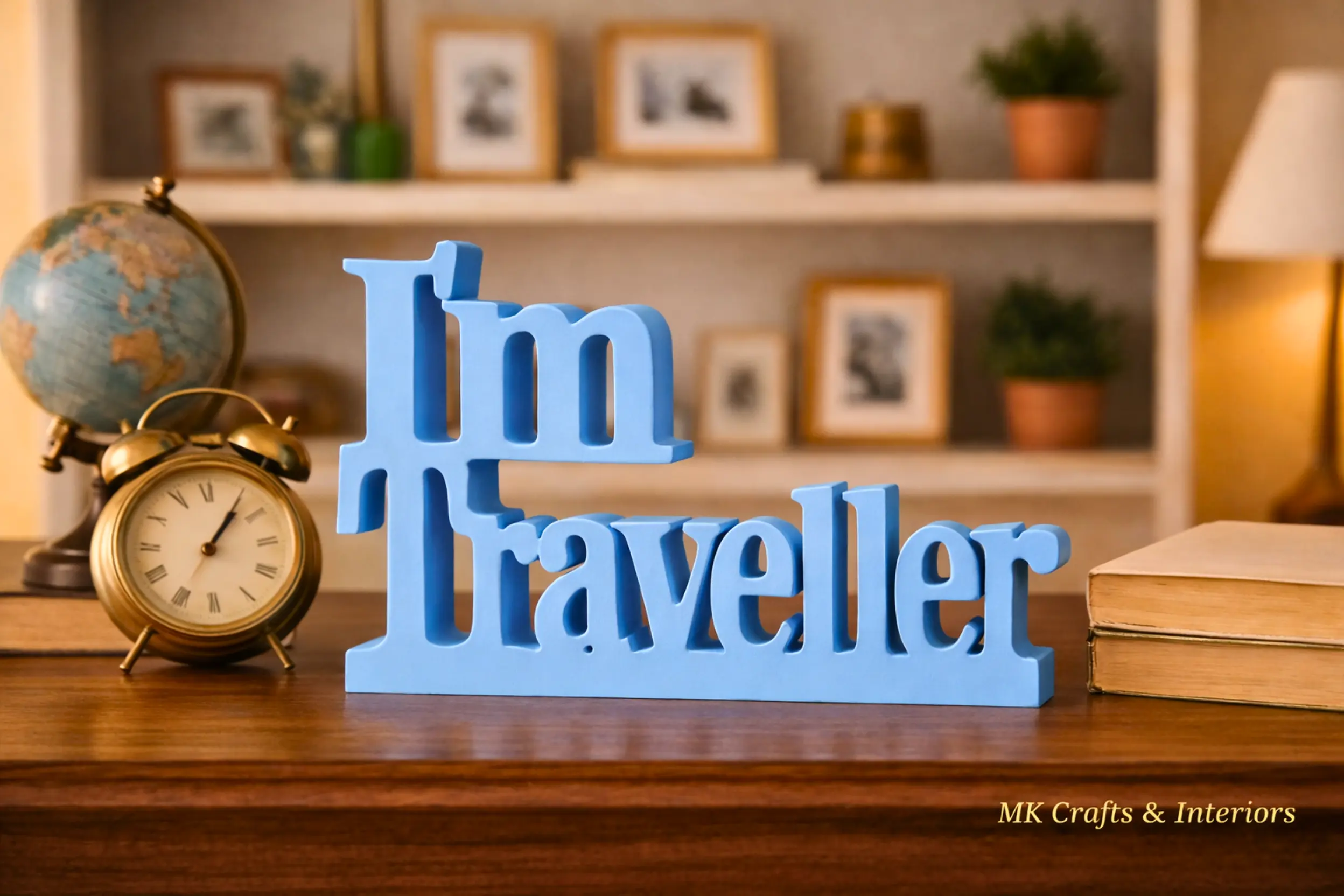 Light blue “I’m Traveller” wooden decorative showpiece by MK Crafts & Interiors in Hyderabad placed on shelf – travel themed home décor gift.