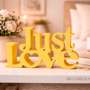 Yellow “Just Love” wooden decorative showpiece by MK Crafts & Interiors in Hyderabad – cheerful romantic home décor.