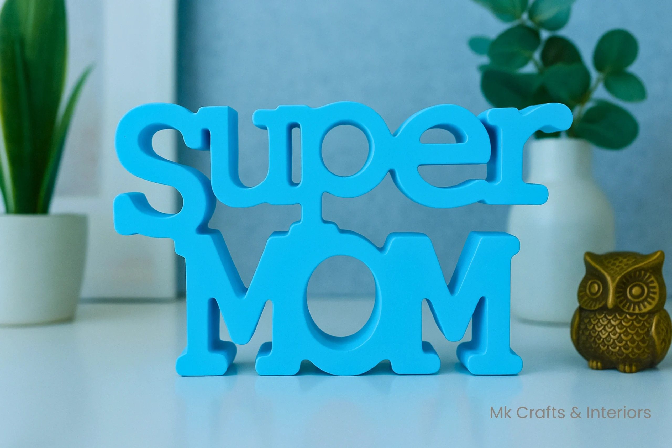 Light blue Super Mom wooden decorative showpiece by MK Crafts & Interiors Hyderabad placed on tabletop – Mother’s Day gift home décor item.