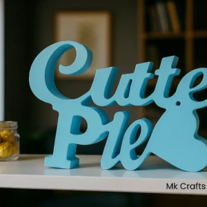 Light blue “Cutie Pie” wooden decorative showpiece by MK Crafts & Interiors in Hyderabad placed on table – handcrafted cute gift décor.