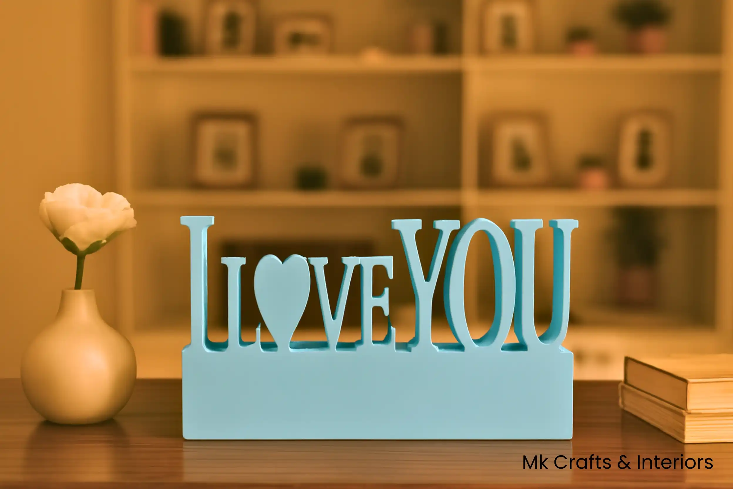 Light blue “I Love You” wooden decorative showpiece by MK Crafts & Interiors in Hyderabad placed on tabletop – romantic home décor gift.