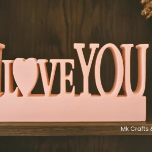 Light peach “I Love You” wooden tabletop decorative showpiece by MK Crafts & Interiors Hyderabad – romantic gift décor.