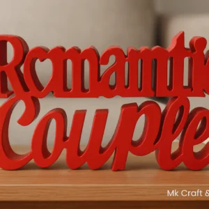 Red wooden “Romantic Couple” decorative showpiece by MK Crafts & Interiros placed on a table – handcrafted love and anniversary gift décor.